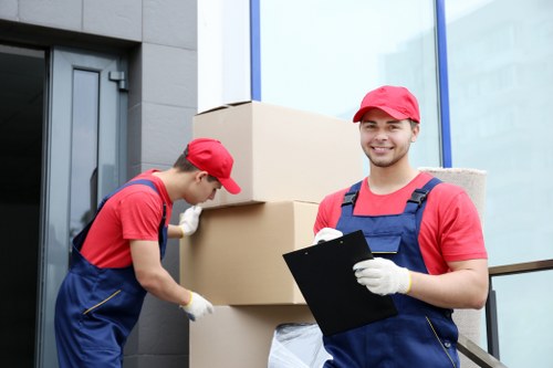 Office relocation planning in Shoreditch with moving boxes and desks