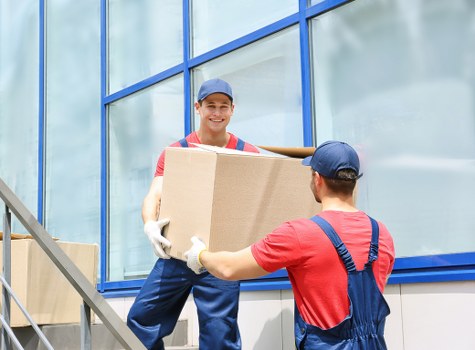 Packed office boxes and furniture ready for transport in Shoreditch