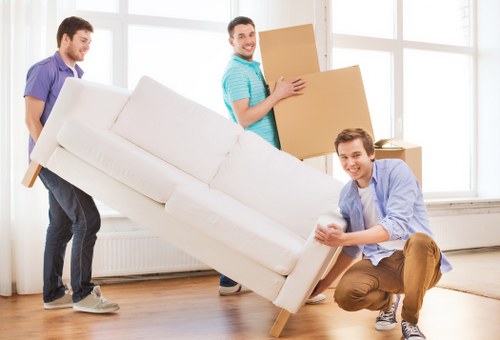 Careful loading of household items from a Shoreditch flat with stair access