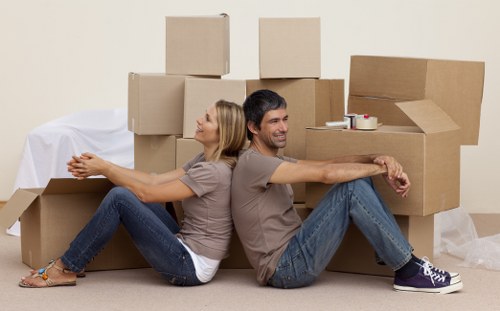 Organised office furniture and packing supplies for a Shoreditch move