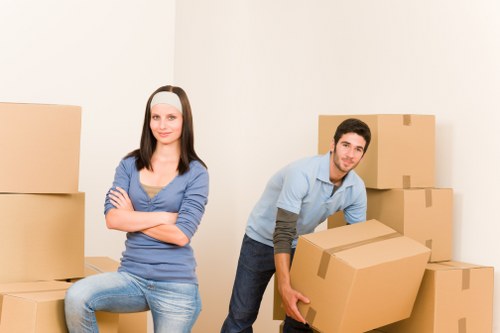Removal team loading furniture for a flat or office move in Shoreditch