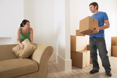 Loading household furniture into a local removal van in Shoreditch